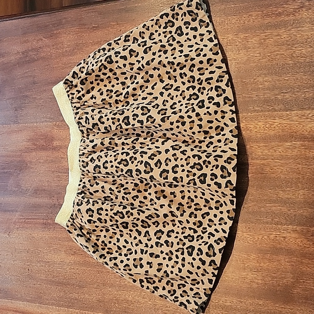 NEW WITH TAGS- Girls Leopard print- Carters size 10/12 skirt- corduroy.